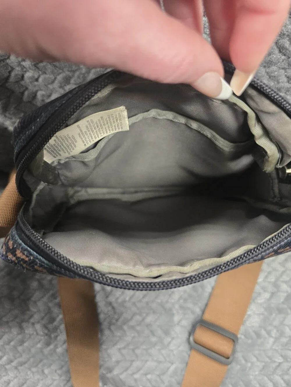 The North Face Navy Patterned Crossbody with Tan Strap
